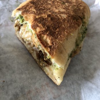 Tropical Smoothie Cafe - The Chicken Caprese Sandwich (one half of it) - Juice Bars & Smoothies Near Me - Jacksonville, Florida