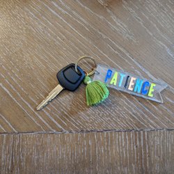Joe the Mechanic - Picture of the replacement key with keychain that reads "patience"