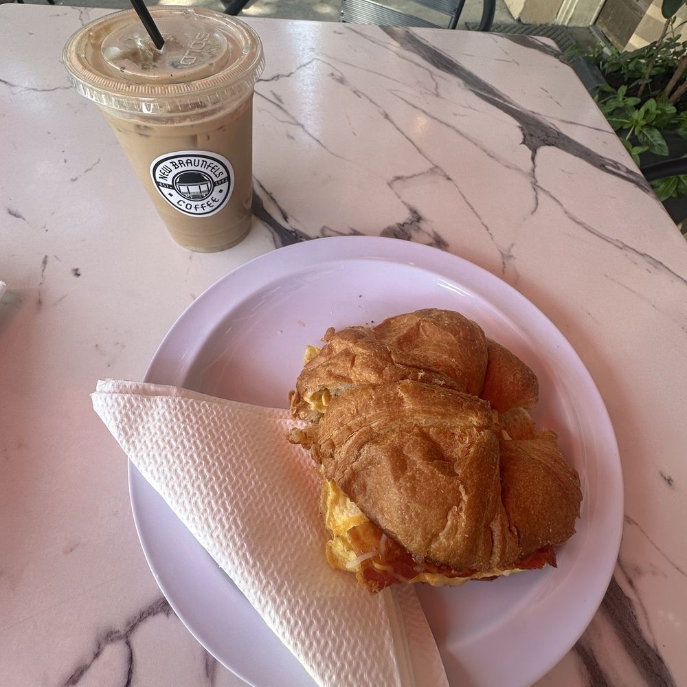 Bacon egg and cheese on a croissant Vanilla latte with cinnamon Bacon egg and cheese on a croissant Vanilla latte with cinnamon