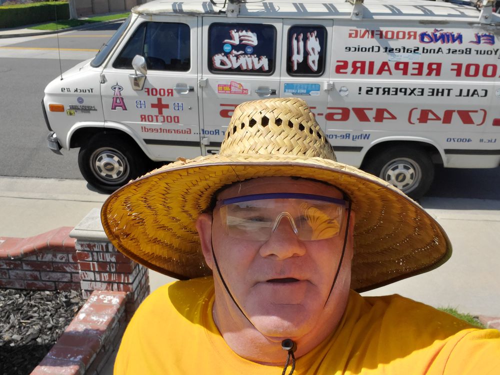 Slide of Mikes Roofing