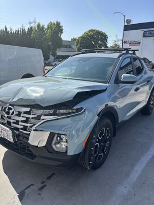 2024 Santa Cruz - Front end damage on Hyundai Santa Cruz with airbags deployed. Repairs completed through insurance