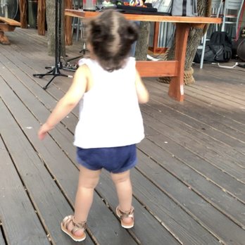 Hops & Thyme - Luna enjoying the live music. - Beer Gardens Near Me - Lakeway, Texas