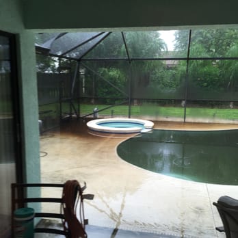 Martin Pools & Spas - a view of the pool from the patio - Pool Cleaners Near Me - Melbourne, Florida