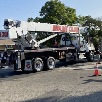Jimmie's Tree Service - a truck with a crane on the back - Tree Services Near Me Jimmie's Tree Service - a truck with a crane on the back - Tree Services Near Me