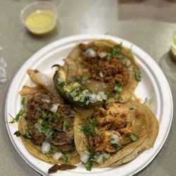 El Taquero Comer - Chorizo taco, chicken taco, deshebrada taco