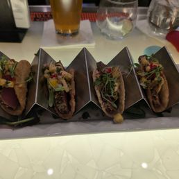 Ahi taco appetizer and beer