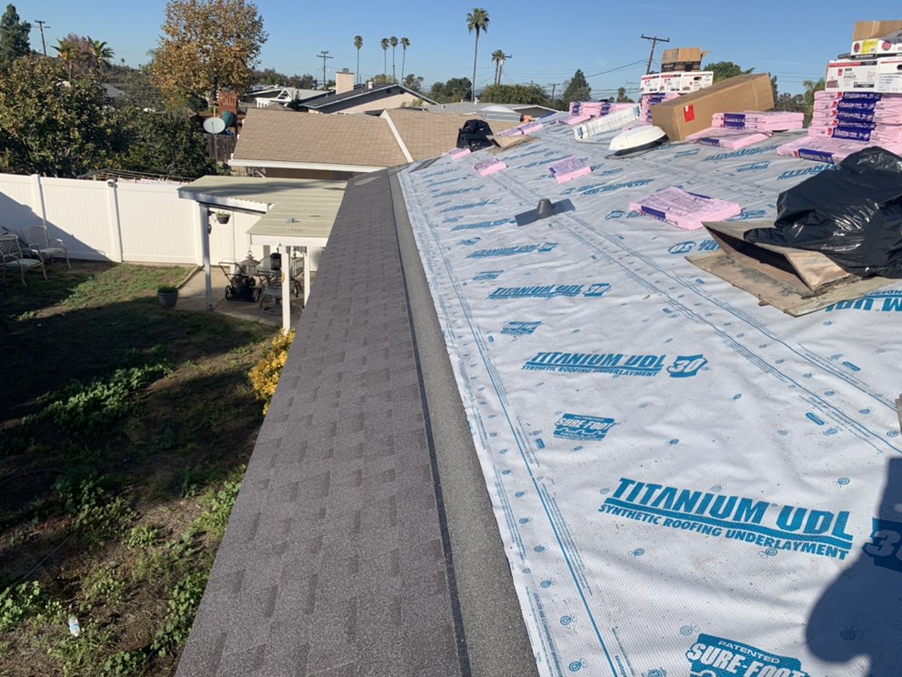 Slide of M G Roofing