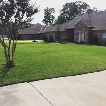 Larson's Lawn & Landscape - the front yard of a home - Tree Services Near Me - Mustang, Oklahoma Larson's Lawn & Landscape - the front yard of a home - Tree Services Near Me - Mustang, Oklahoma