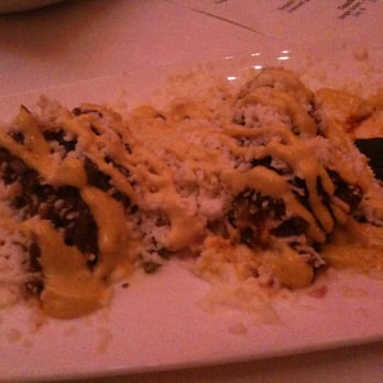 Carnivale Chicago - Ropa Vieja - sweet plantains with braised beef topped with cheesy spicy mayo - Latin American Near Me - Chicago, Illinois Carnivale Chicago - Ropa Vieja - sweet plantains with braised beef topped with cheesy spicy mayo - Latin American Near Me - Chicago, Illinois
