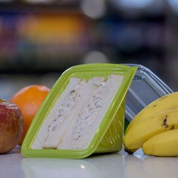 QMart - a sandwich in a plastic container next to bananas and an apple - Tex-Mex Near Me - Houston, Texas QMart - a sandwich in a plastic container next to bananas and an apple - Tex-Mex Near Me - Houston, Texas