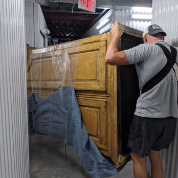 Reign Moving Solutions Charlotte - Moving heavy armoire - Movers Near Me - Charlotte, North Carolina