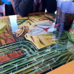 Tacos & Grill Mexican Cuisine - Empty table waiting and waiting and waiting for our simple order to show... simply put... Slow.. not coming back...