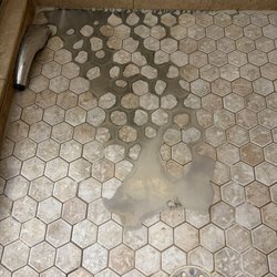 ProSource of Daytona Beach - Thinset from the living room went through the wall into shower through a broken pan.