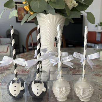 Ann’s Sweet Treats - Bride & groom cake pops. These are just a few leftover from the event. They were an absolute hit! - Desserts Near Me Ann’s Sweet Treats - Bride & groom cake pops. These are just a few leftover from the event. They were an absolute hit! - Desserts Near Me