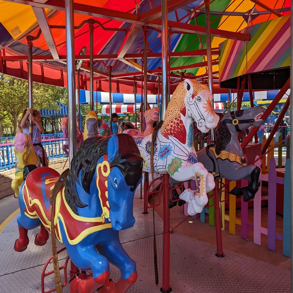 Pixieland Amusement Park - Superman and Batman horses with oldie sound effect style horse in the middle - Amusement Parks Near Me - Concord, California