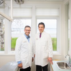 Mark D Krull, DDS - Harborside Dental - Drs. Kozelko and Krull in one of the waterfront patient rooms.