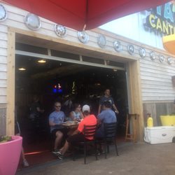 Rita's Cantina - Garage door opened up to a small part of the patio