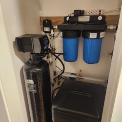 Home Water Conditioning - Water softener, whole house filter, brine tank and lots of valves and plumbing.