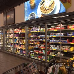 ALDI - Dairy section. Lightweight, all-glass doors have great visibility and easy access. Nice update!