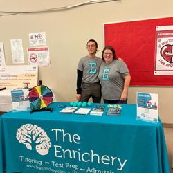 The Enrichery - Director Melanie and OM Alex at a Pershing Middle School event