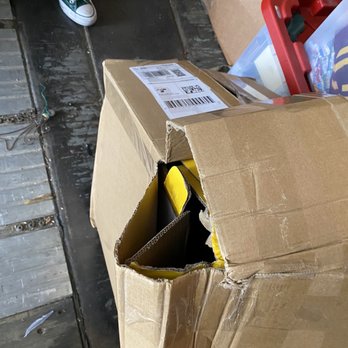 Two Men And A Truck - Another box marked fragile and was underneath big boxes - Movers Near Me