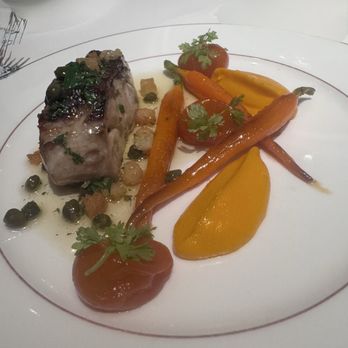 Spruce - Roasted striped bass, baby carrots, kumquat confit, sauce grenobloise - American Near Me - San Francisco, California Spruce - Roasted striped bass, baby carrots, kumquat confit, sauce grenobloise - American Near Me - San Francisco, California