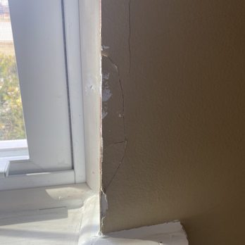 Comfort Windows & Doors - Wall cracks, chipped paint from installing a wrong sized window - Windows Installation Near Me - Tonawanda, New York Comfort Windows & Doors - Wall cracks, chipped paint from installing a wrong sized window - Windows Installation Near Me - Tonawanda, New York