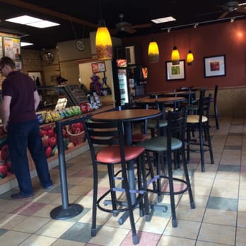 Subway - a man standing at a counter in a restaurant - Sandwiches Near Me - Roseburg, Oregon