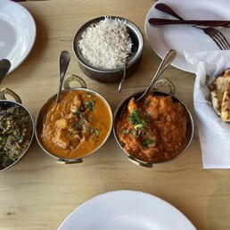 Saag Paneer, Lamb Vindaloo, Chicken masala, cheesy naan for the perfect lunch!