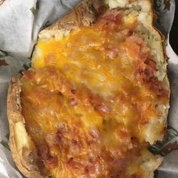 McAlister's Deli - Gigantic big potato with cheddar cheese bacon - Delis Near Me - Oklahoma City, Oklahoma McAlister's Deli - Gigantic big potato with cheddar cheese bacon - Delis Near Me - Oklahoma City, Oklahoma