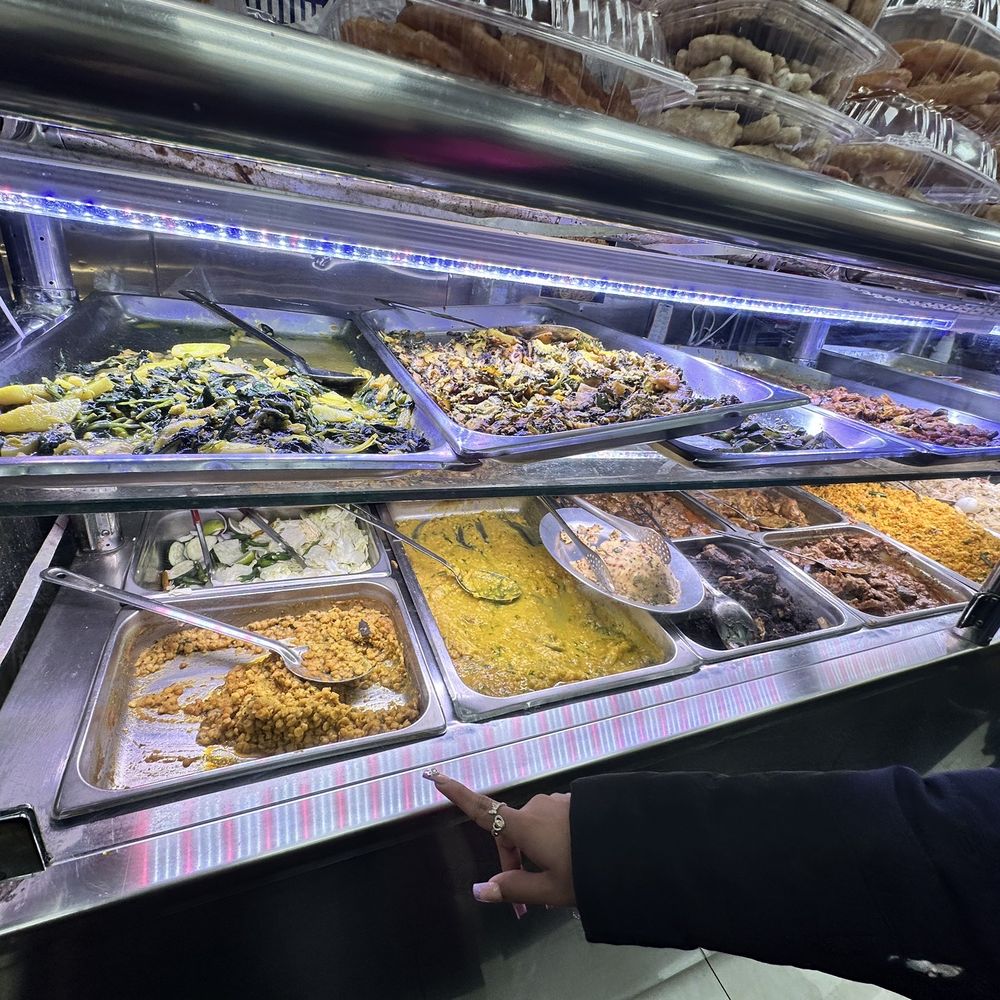 Abdullah Sweets and Restaurant - a display of food - Halal Near Me - Jackson Heights, New York