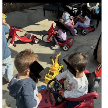 Nora 's Day Care - Little riders enjoying the sunshine - Child Care & Day Care Near Me - Anaheim, California Nora 's Day Care - Little riders enjoying the sunshine - Child Care & Day Care Near Me - Anaheim, California