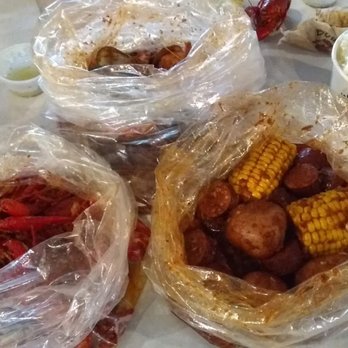 The Boiling Crab - combo meal with crawfish , shrimp , clams , mussels , 2 corn 3 potatoes , half sausage and 2 rice 37 $ - Seafood Near Me - Honolulu, Hawaii The Boiling Crab - combo meal with crawfish , shrimp , clams , mussels , 2 corn 3 potatoes , half sausage and 2 rice 37 $ - Seafood Near Me - Honolulu, Hawaii