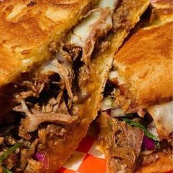 Tacos El JEFE Phoenix - Birria torta with beans, onions and cilantro served with consommé