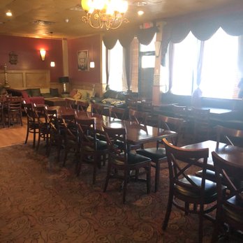 Cafe Bombay - Inside dining area also has a bar in the back of room - Indian Near Me - Norcross, Georgia Cafe Bombay - Inside dining area also has a bar in the back of room - Indian Near Me - Norcross, Georgia