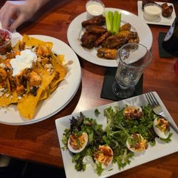 Finnegan's Grill & Irish Pub - Wings, Buffalo chicken Nachos, and Deviled Eggs. All delicious and we had plenty to take with us.