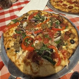 Garden pizza with meatballs added. Burnt edges and on the bottom of those slices. Garden pizza with meatballs added. Burnt edges and on the bottom of those slices.