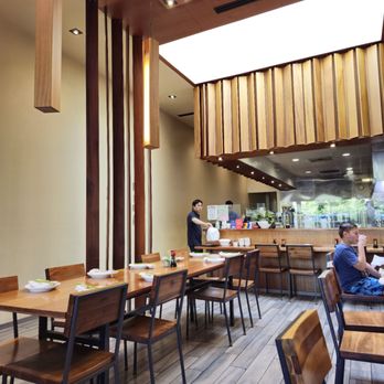 Steam - a dining area with wooden tables and chairs - Dim Sum Near Me - Palo Alto, California Steam - a dining area with wooden tables and chairs - Dim Sum Near Me - Palo Alto, California