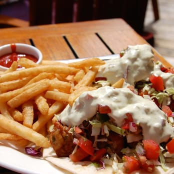 Pacific's Edge Restaurant - Fish Tacos (local catch, beer battered, jack cheese, green chili aioli salsa. $21) - 3.5 stars - Seafood Near Me - Carmel, California Pacific's Edge Restaurant - Fish Tacos (local catch, beer battered, jack cheese, green chili aioli salsa. $21) - 3.5 stars - Seafood Near Me - Carmel, California