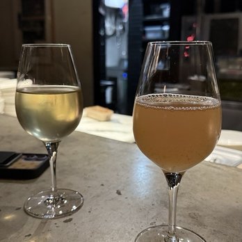 Rhodora Wine Bar - Glass of sav blanc and orange - Wine Bars Near Me - Brooklyn, New York Rhodora Wine Bar - Glass of sav blanc and orange - Wine Bars Near Me - Brooklyn, New York