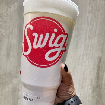 Swig - a hand holding a cup with a straw - Desserts Near Me - Draper, Utah