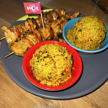 Nando's Peri-Peri - Chicken skewers with rice - South African Near Me - Skokie, Illinois