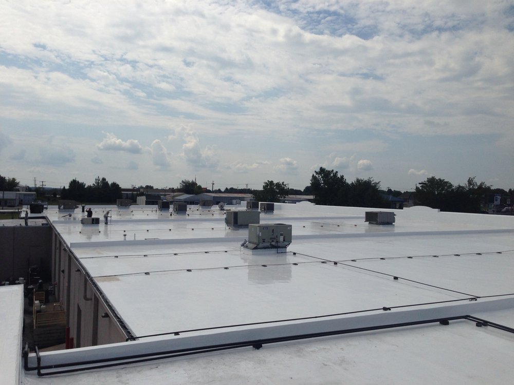 Slide of PM Commercial & Industrial Roofing