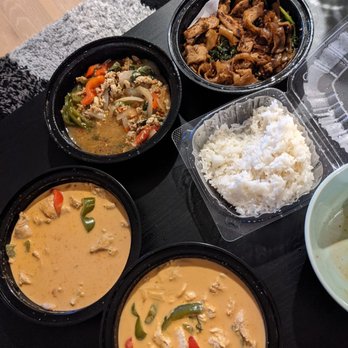 Pattaya - Starting from the bottom going clockwise: Red Curry, Penang curry, basil chicken, pad see ew - Thai Near Me - Philadelphia, Pennsylvania