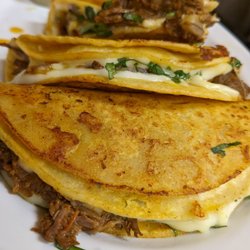 Que Rico