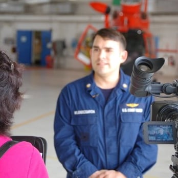 Tam Communications - Susan O'Connor Fraser interviewing a member of the U.S. Coast Guard. - Video/Film Production Near Me Tam Communications - Susan O'Connor Fraser interviewing a member of the U.S. Coast Guard. - Video/Film Production Near Me