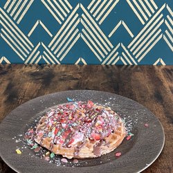 Crepology - Brick (waffle) with vanilla crème, Nutella, strawberries, and Fruity Pebbles