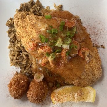Nuttin Betta - Catfish Bayou - Fried Catfish over Dirty Rice, drizzled with Crawfish Etouffee, 2 Hushpuppies, 1 lemon wedge. Fantastic. - Seafood Near Me - San Antonio, Texas