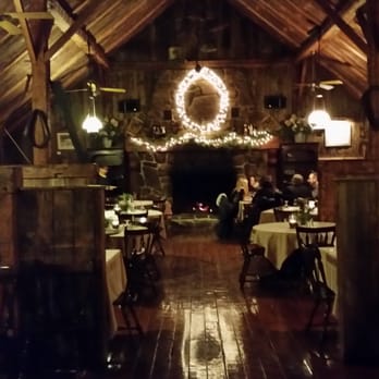 The Red Fox - Historic barn dining room upstairs, massive fireplace and ceiling bestowed with antique farm equipment. - Pubs Near Me - Bondville, Vermont
