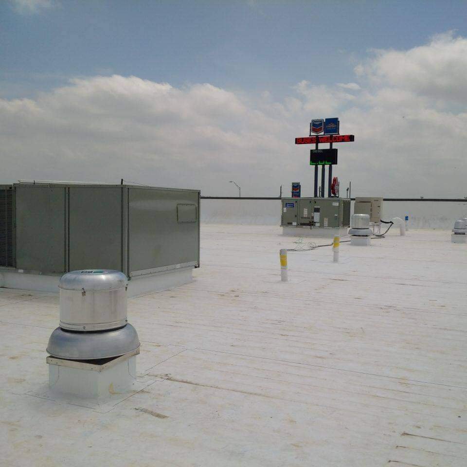 Slide of Wells Roofing Systems
